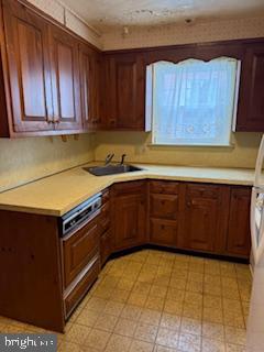 493 Wheatsheaf Road Springfield, PA 19064 - Photo 7 of 25 a kitchen with a cabinets and steel appliances