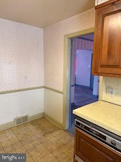 493 Wheatsheaf Road Springfield, PA 19064 - Photo 9 of 25 a view of kitchen and wooden floor