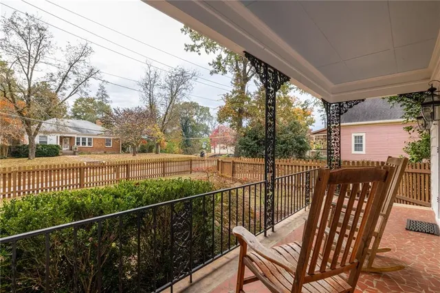 a view of a two chair in the balcony