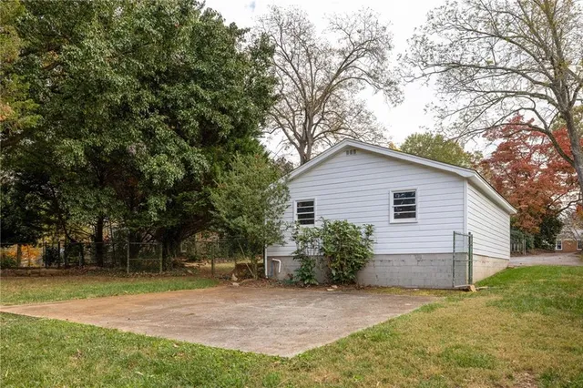 a view of a backyard with a garden