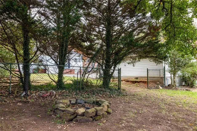 a view of backyard with trees