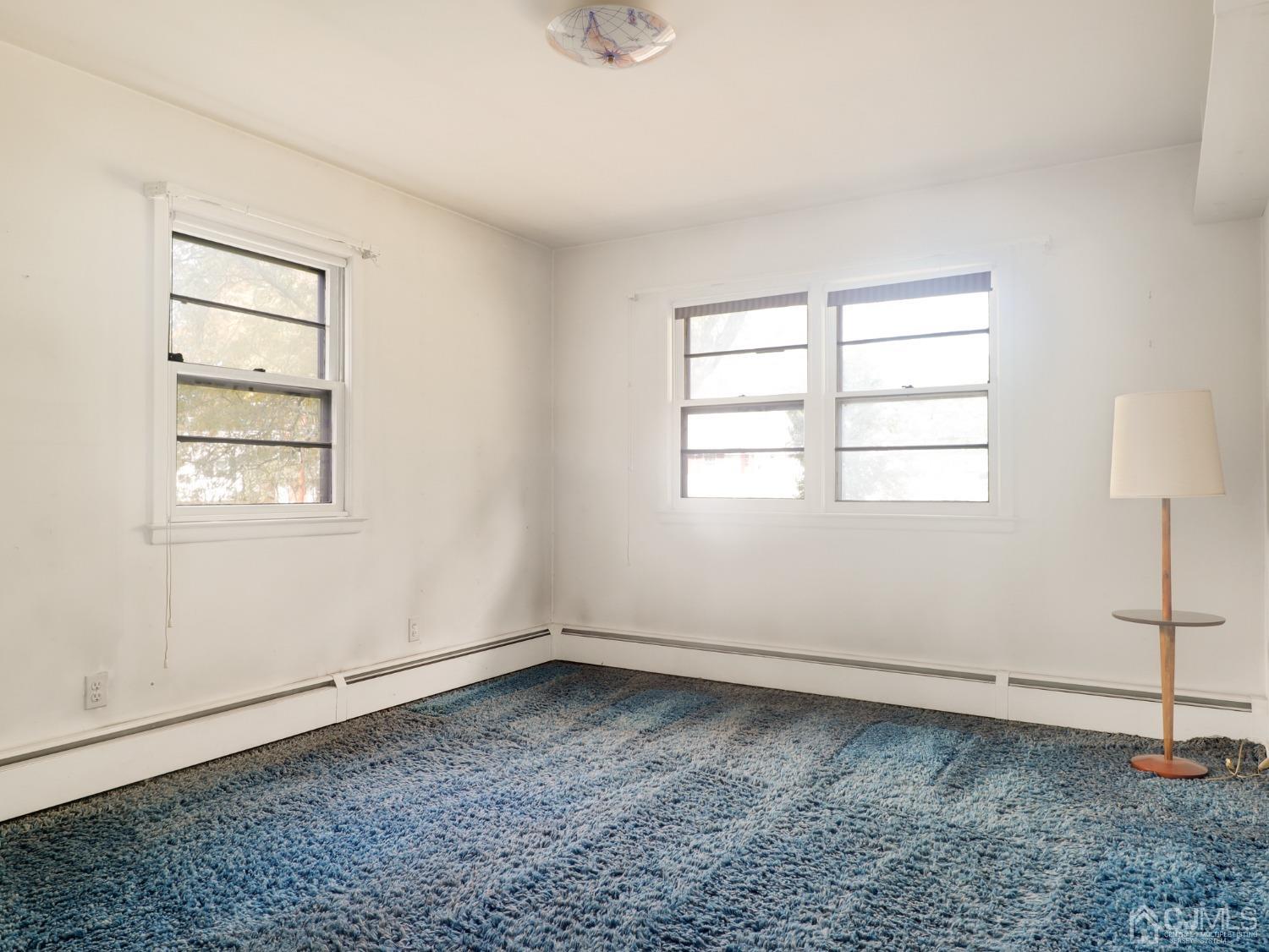 29 Princeton Road Cranford, NJ 07016 - Photo 12 of 24 an empty room with windows