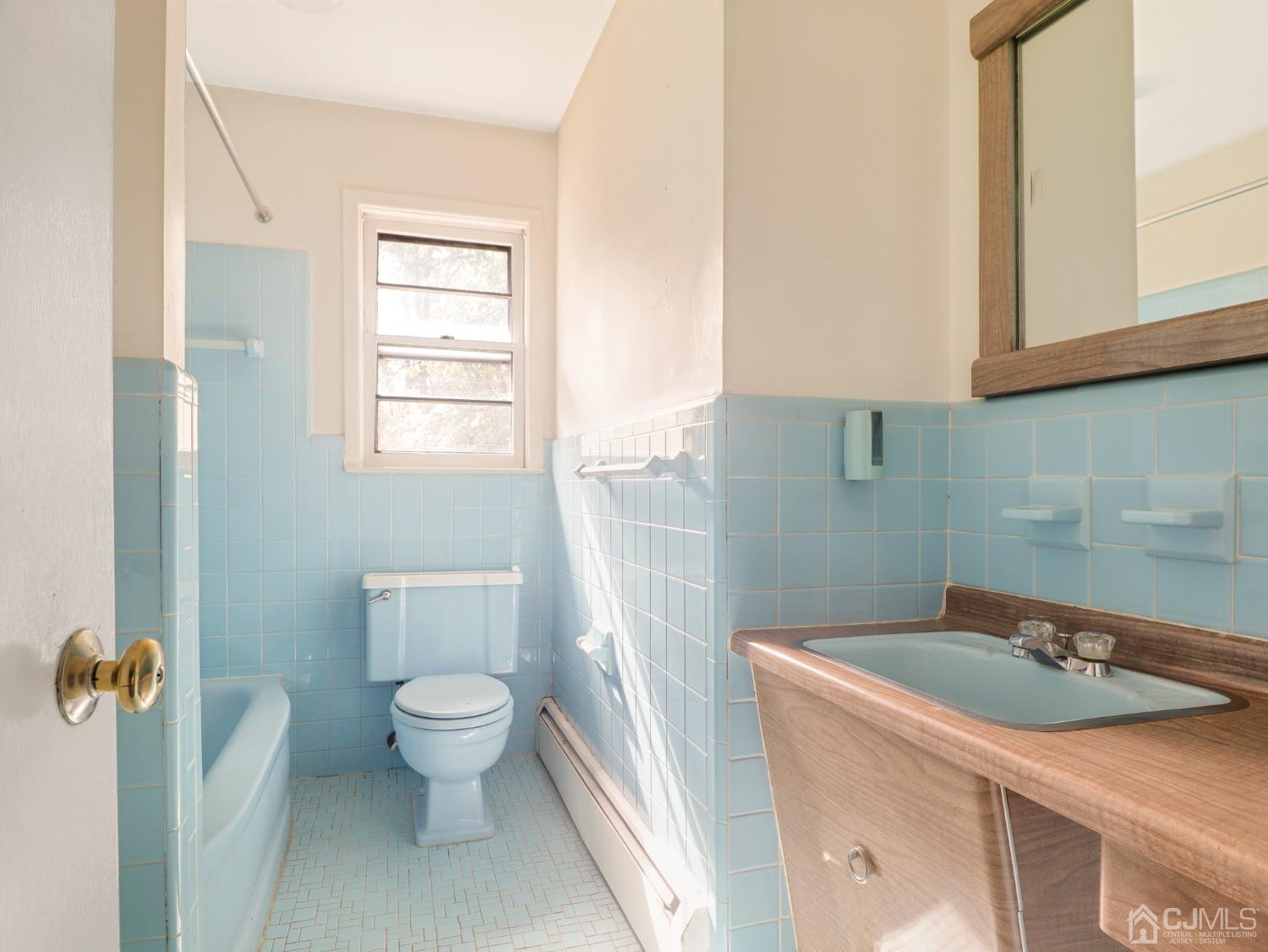 29 Princeton Road Cranford, NJ 07016 - Photo 14 of 24 a bathroom with a sink toilet and shower