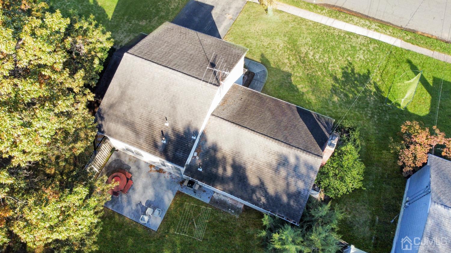 29 Princeton Road Cranford, NJ 07016 - Photo 3 of 24 an aerial view of a house with swimming pool and wooden fence