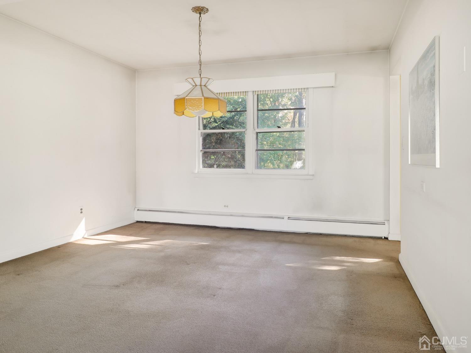 29 Princeton Road Cranford, NJ 07016 - Photo 9 of 24 a view of an empty room with a window