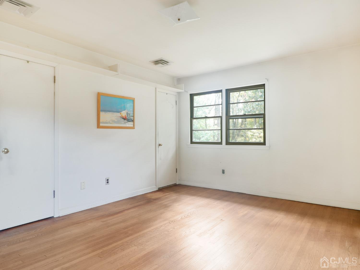 29 Princeton Road Cranford, NJ 07016 - Photo 10 of 24 an empty room with windows