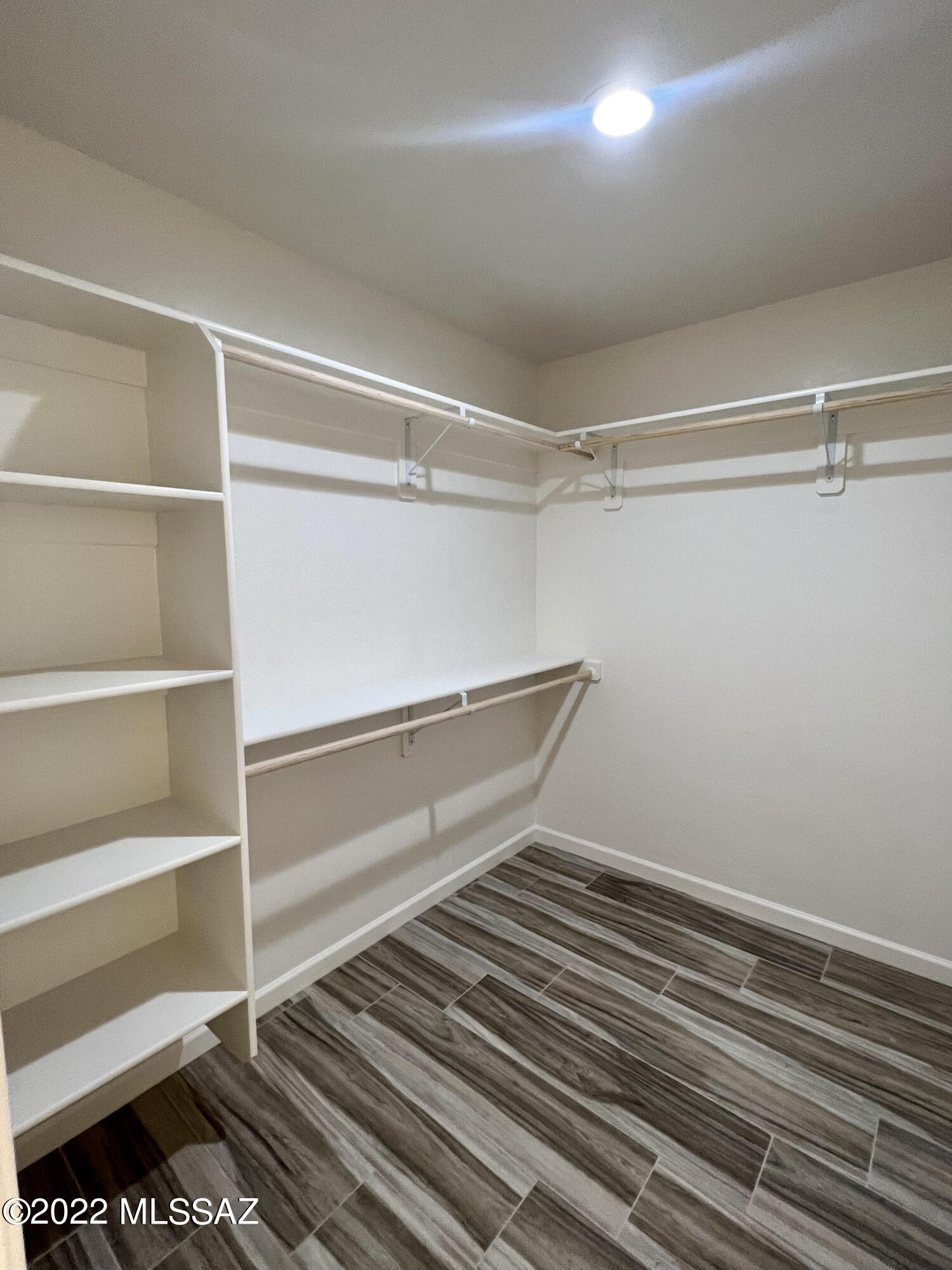 1696 Camino Barrera Rio Rico, AZ 85648 - Photo 16 of 30 a view of an empty walk in closet