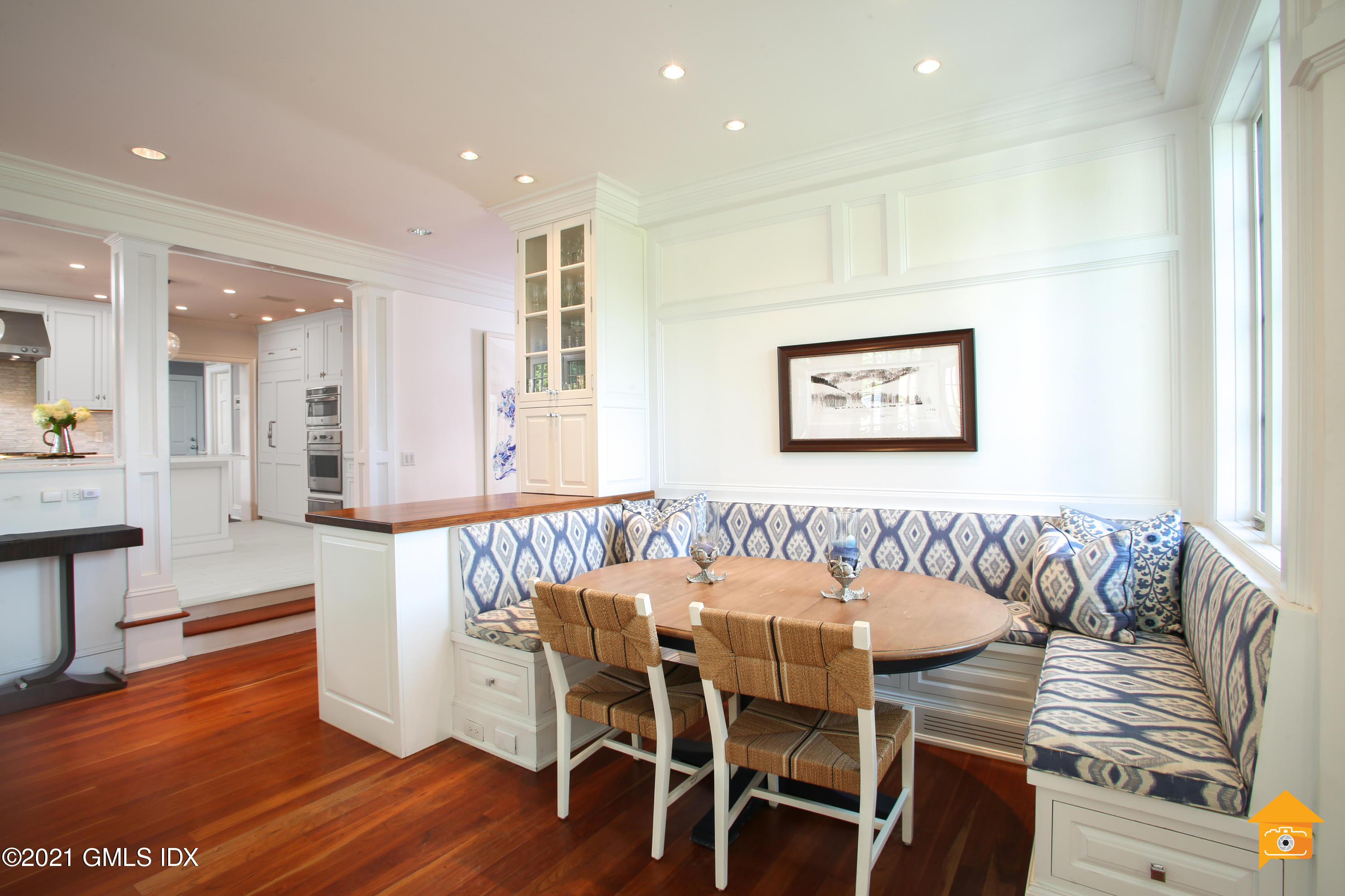 22 Cherry Tree Lane Riverside, CT 06878 - Photo 16 of 50 a view of a dining room with furniture and wooden floor