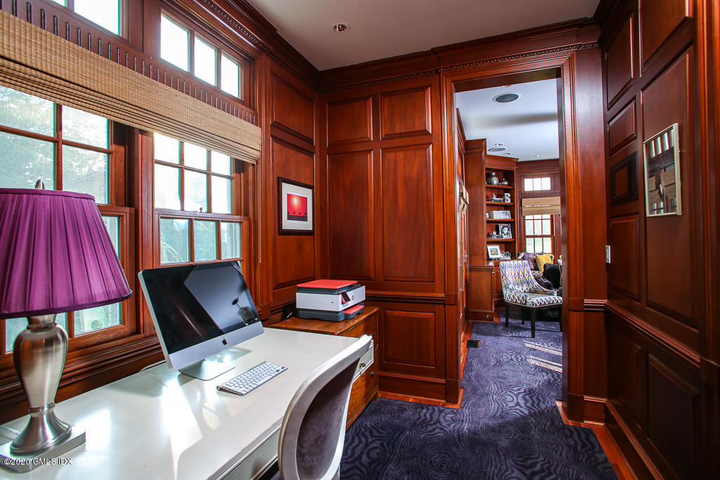 22 Cherry Tree Lane Riverside, CT 06878 - Photo 22 of 50 a view of a workspace with furniture and a window