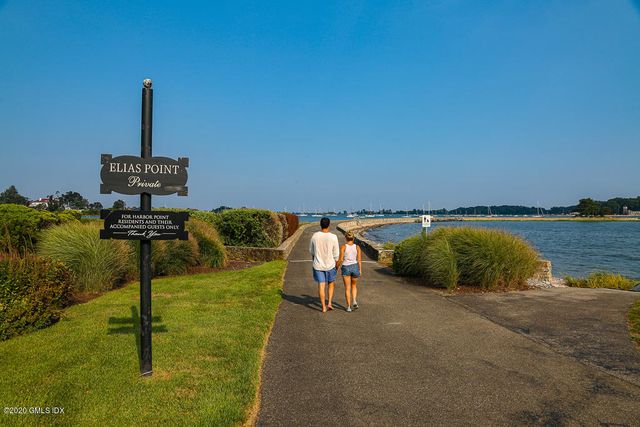 a view of a swimming pool with a lounge chair