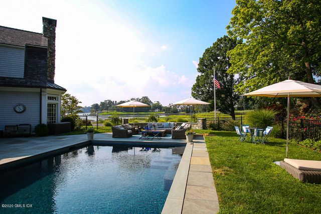 a view of a lake with a yard