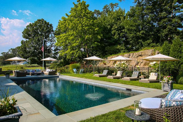 a view of a lake with a house