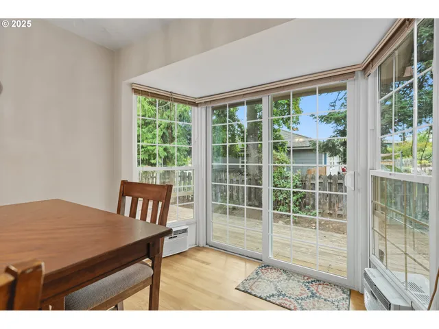 a view of a room that has a bed