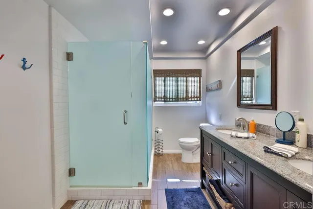 a balcony view with a seating space