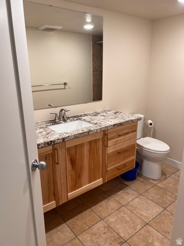 2001 Fielding Hill Lane Draper, UT 84020 - Photo 19 of 21 Bathroom featuring vanity, light tile patterned floors, and recessed lighting