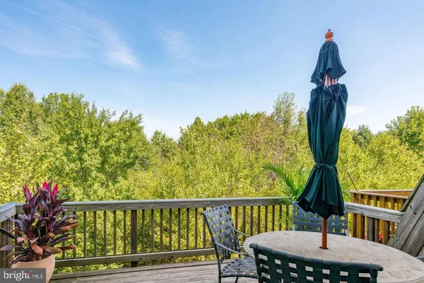 a view of balcony with furniture