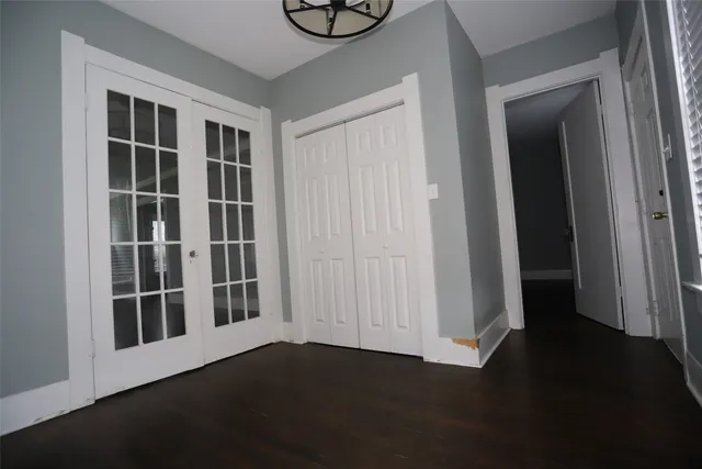 a view of empty room with windows