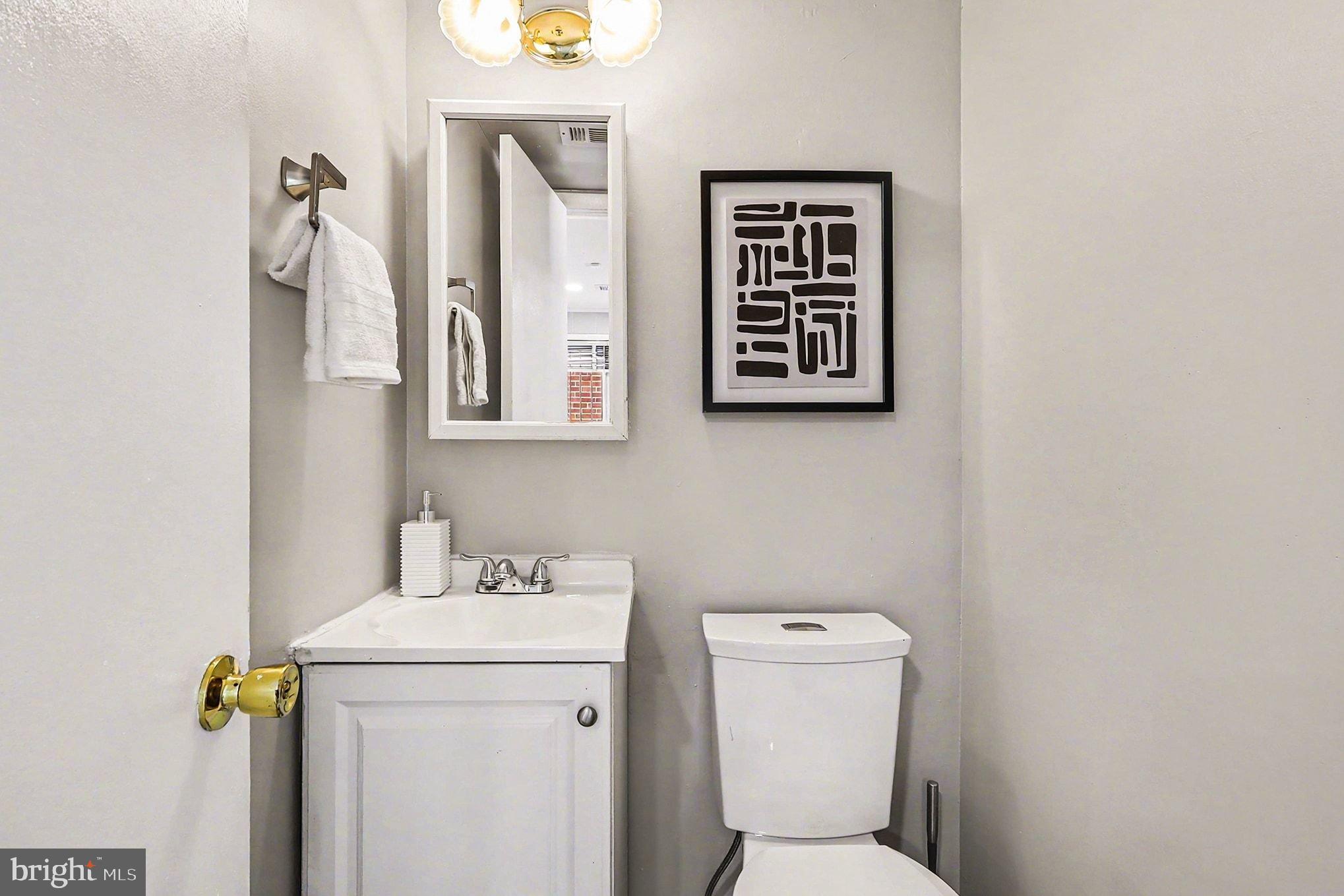 2402 24th Street Southeast Washington, DC 20020 - Photo 13 of 38 Chic and modern half-bath retreat.