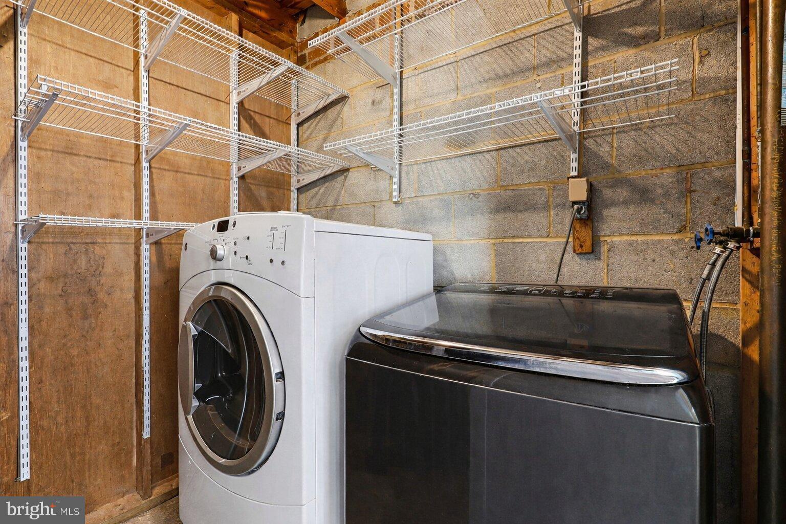 2402 24th Street Southeast Washington, DC 20020 - Photo 14 of 38 Modern laundry space with ample storage.