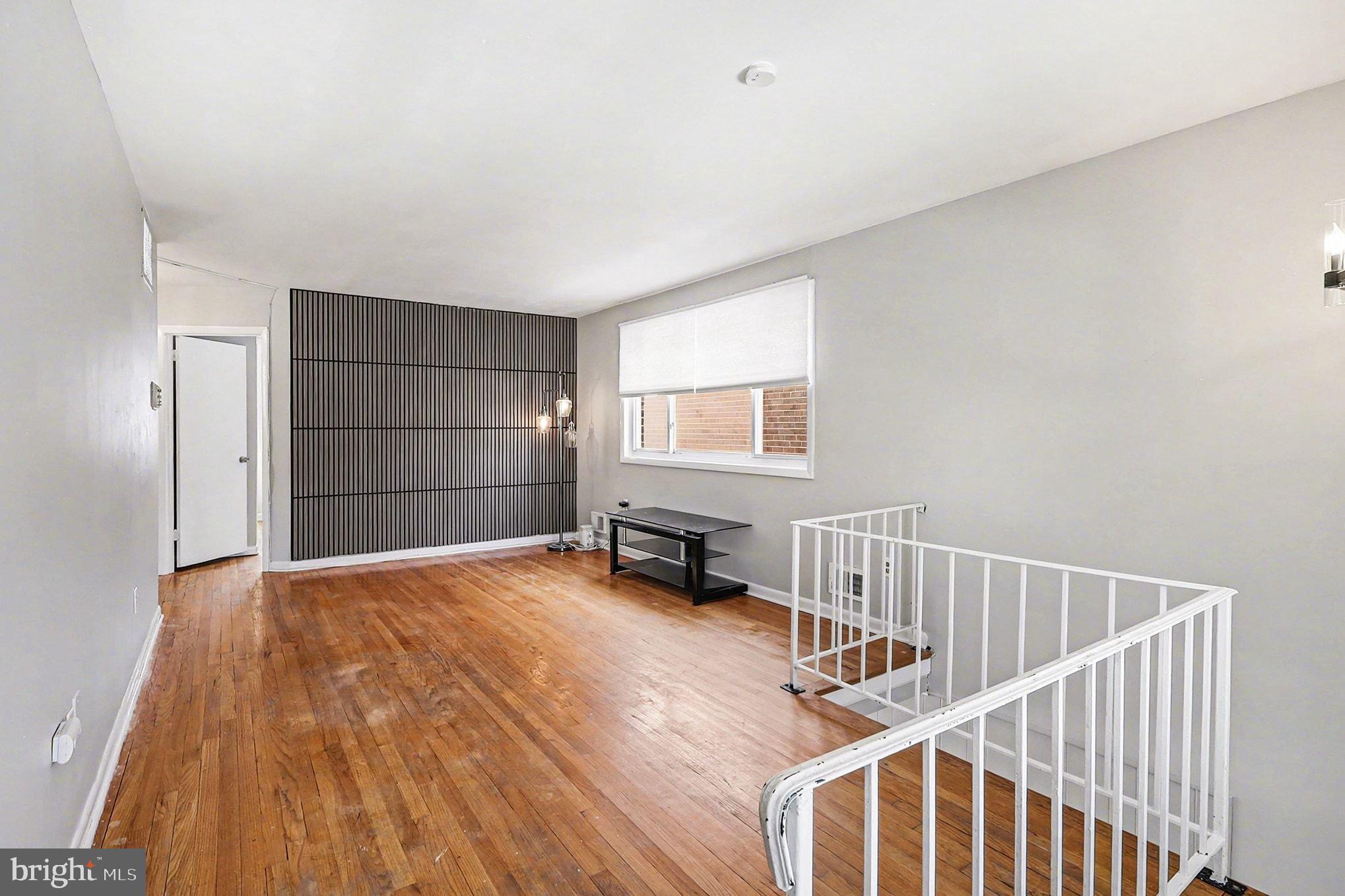 2402 24th Street Southeast Washington, DC 20020 - Photo 19 of 38 Spacious living area with modern accents.