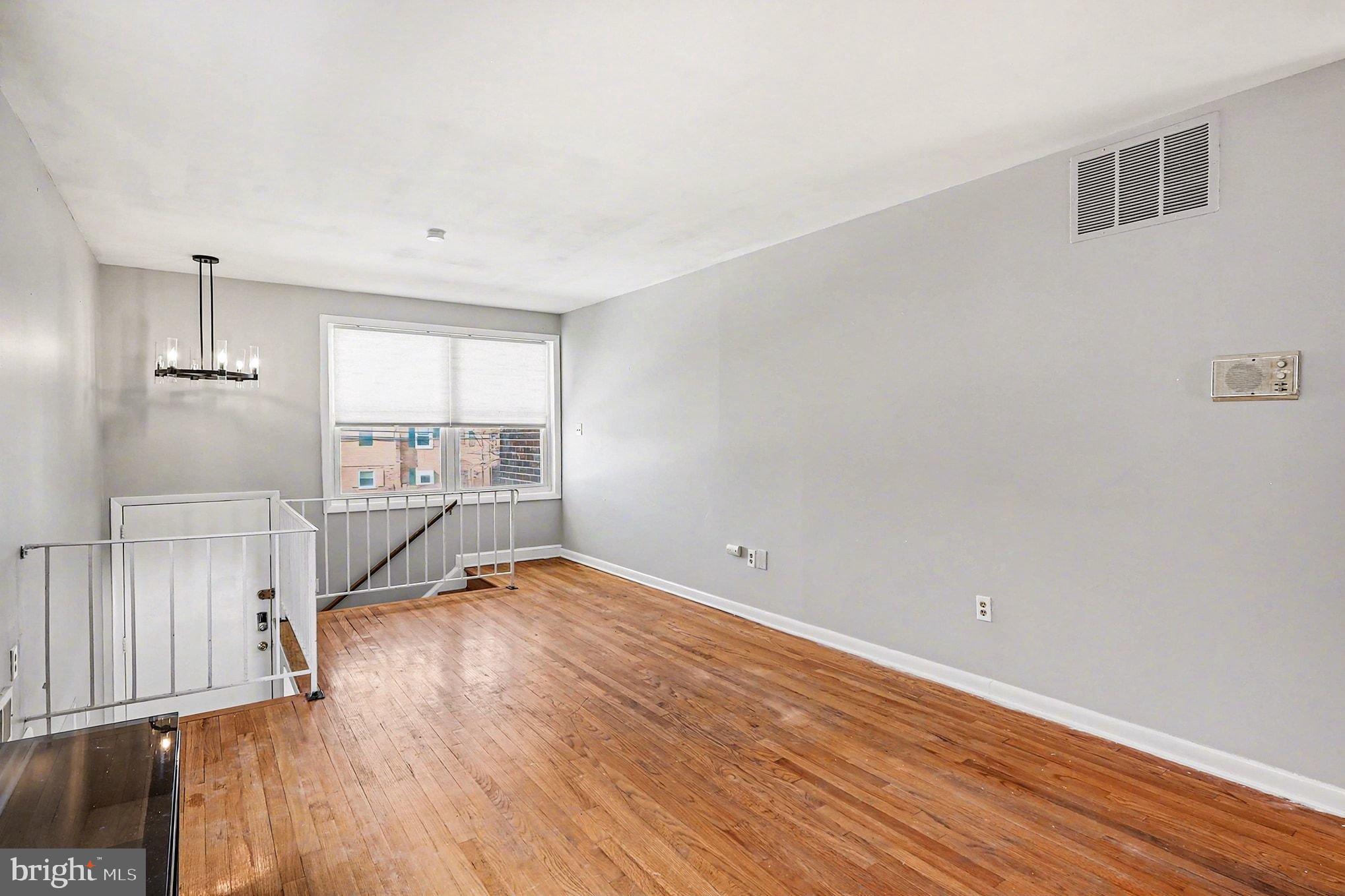 2402 24th Street Southeast Washington, DC 20020 - Photo 20 of 38 Bright and airy space with hardwood floors.