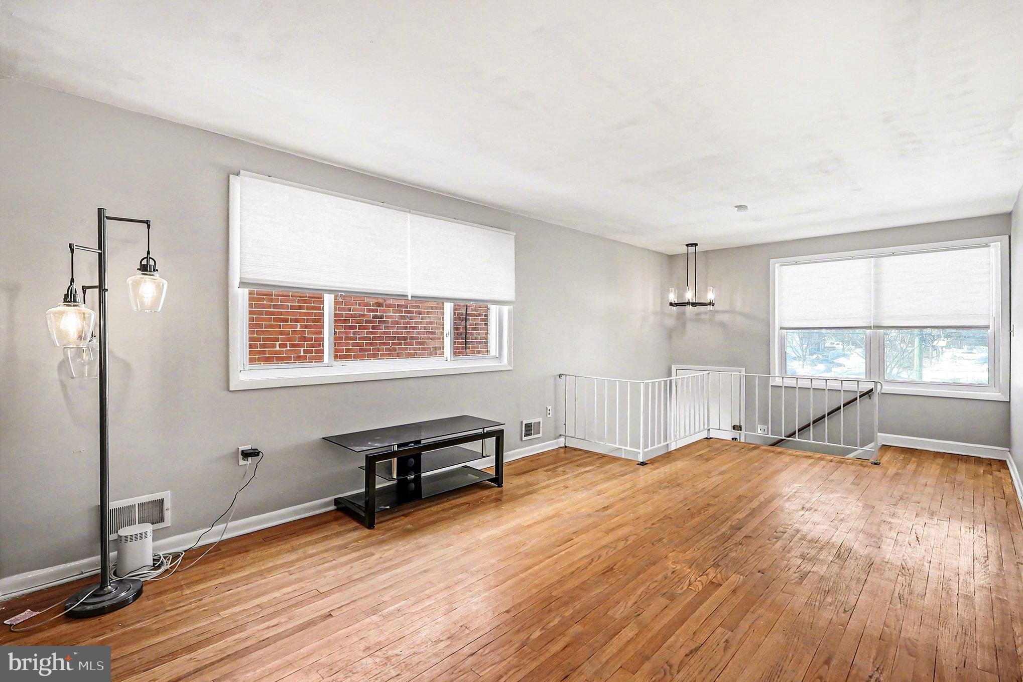 2402 24th Street Southeast Washington, DC 20020 - Photo 21 of 38 Bright and airy living space with hardwood floors.