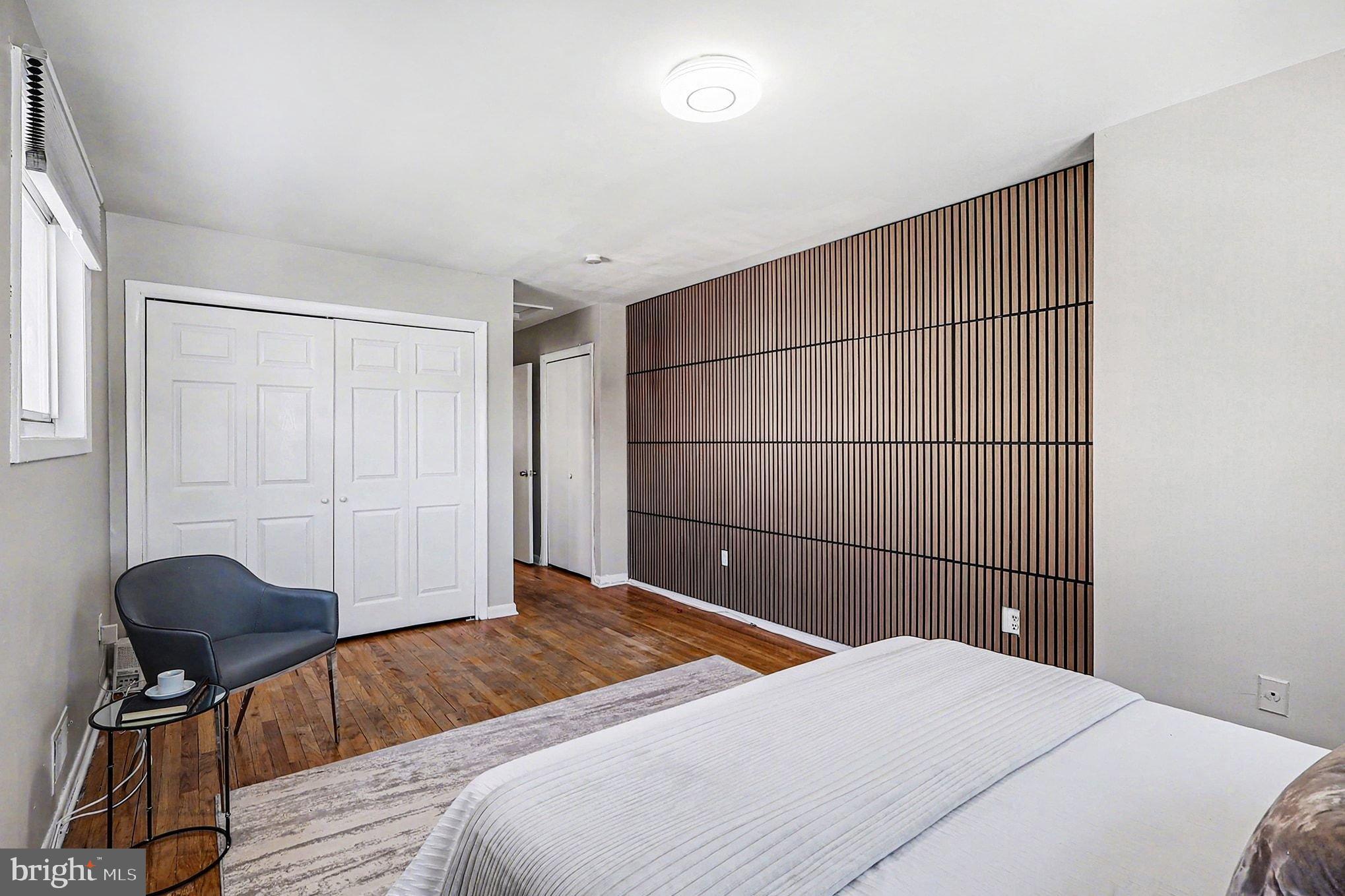 2402 24th Street Southeast Washington, DC 20020 - Photo 24 of 38 Modern bedroom with stylish wood accents.