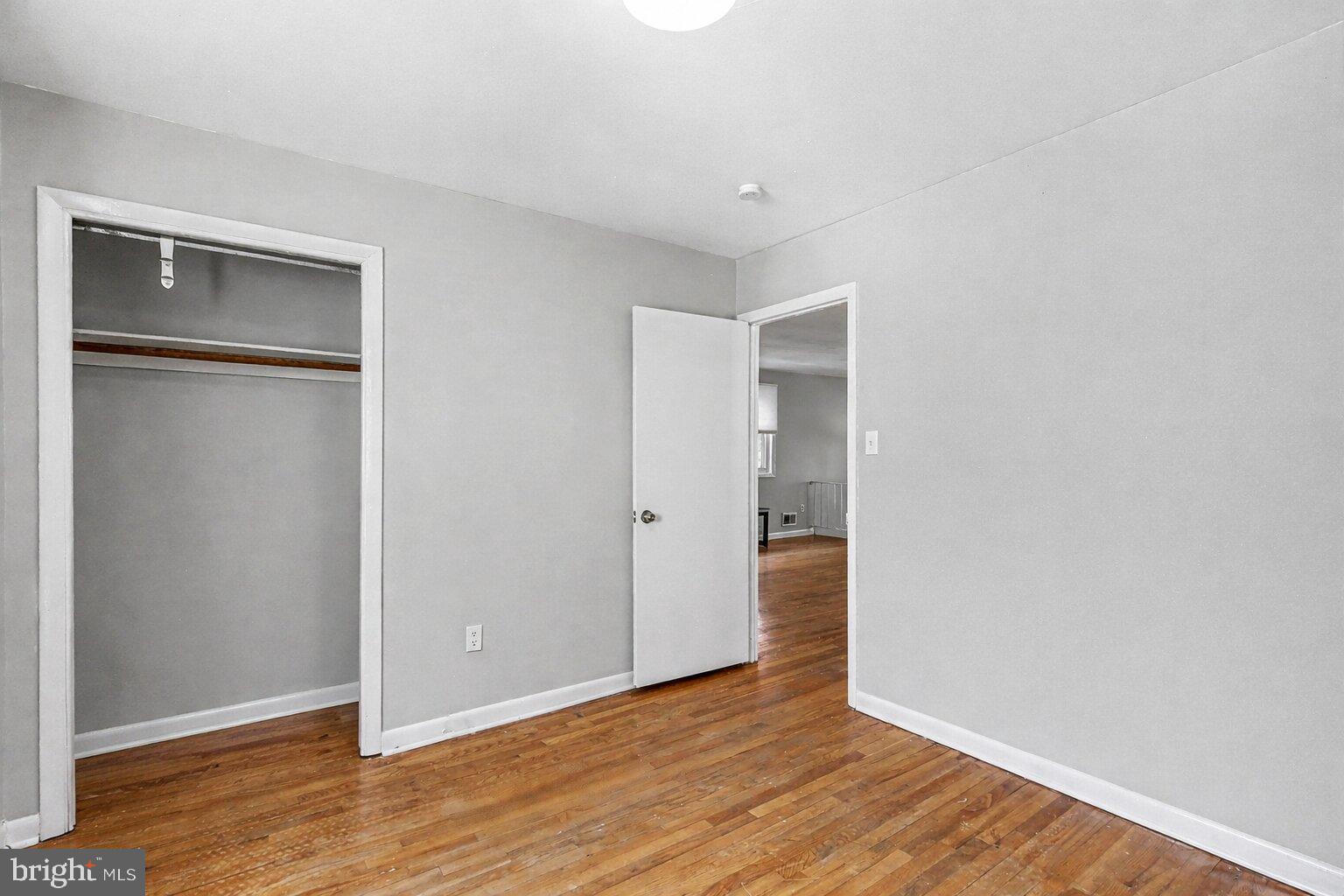 2402 24th Street Southeast Washington, DC 20020 - Photo 29 of 38 Spacious room with warm wooden floors.