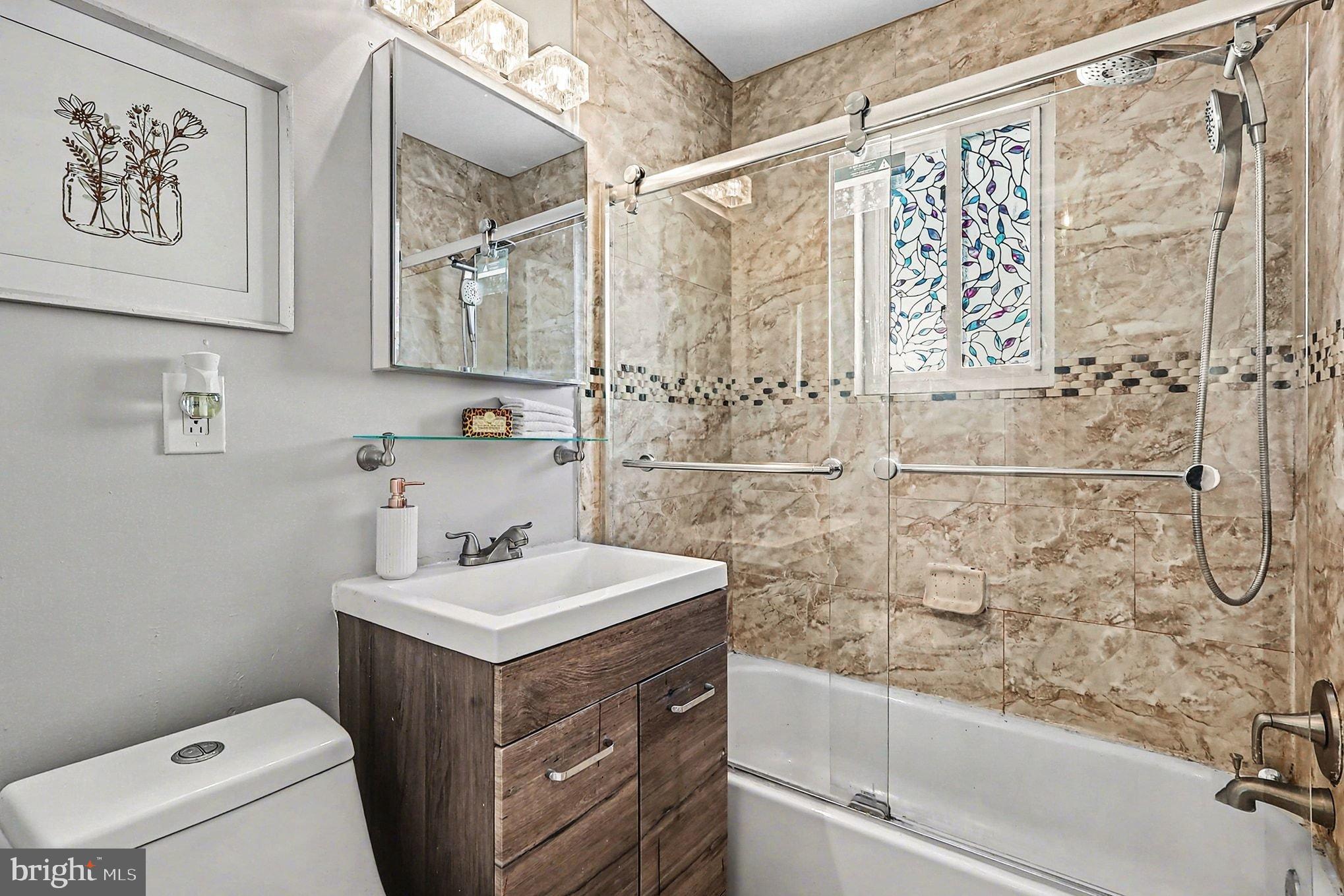 2402 24th Street Southeast Washington, DC 20020 - Photo 34 of 38 Elegant bathroom with modern finishes.