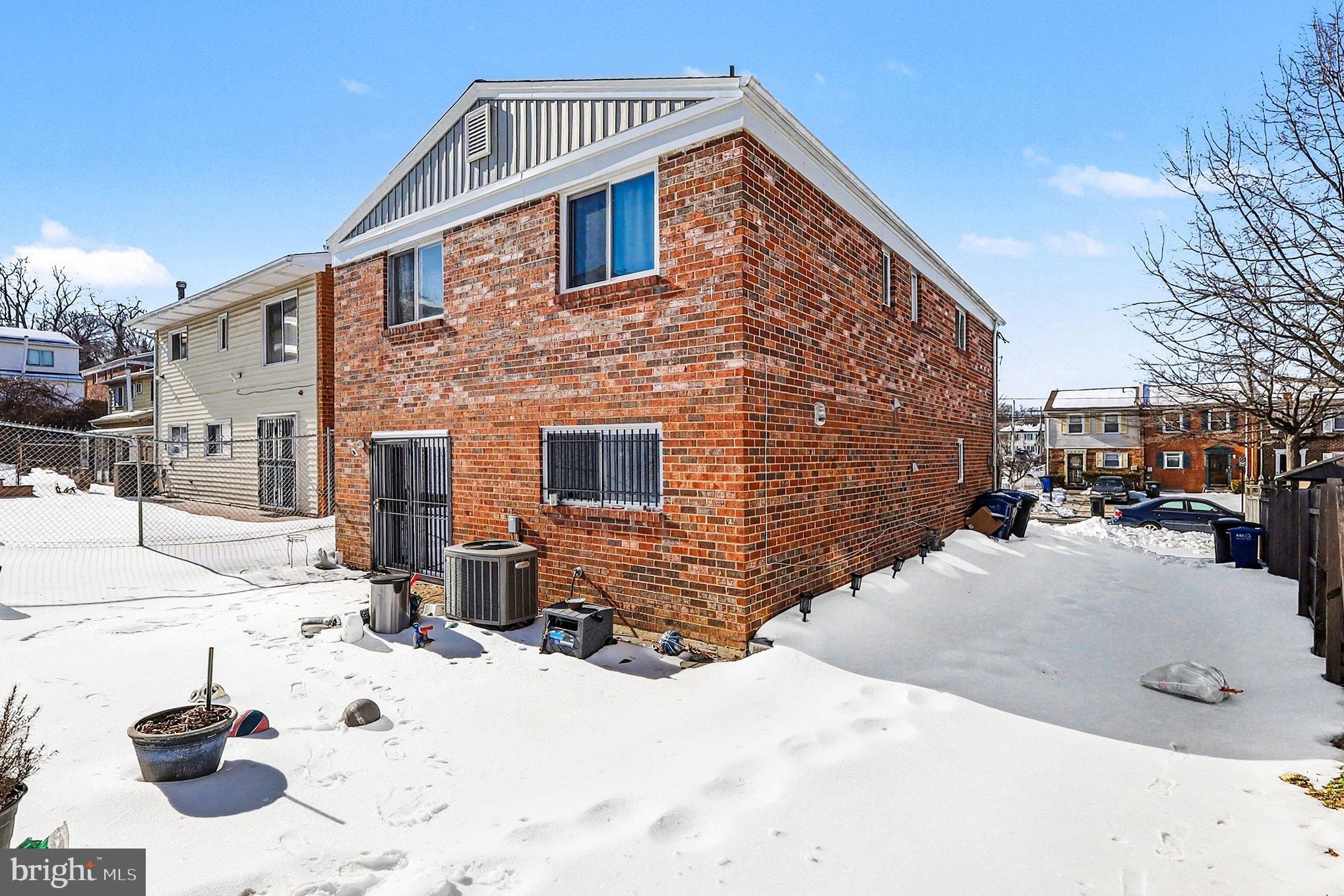 2402 24th Street Southeast Washington, DC 20020 - Photo 39 of 41 Charming brick home nestled in winter's embrace.