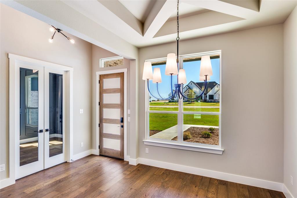 555 Aermotor Loop Weatherford, TX 76085 - Photo 5 of 30 a view of a livingroom with furniture and hardwood floor