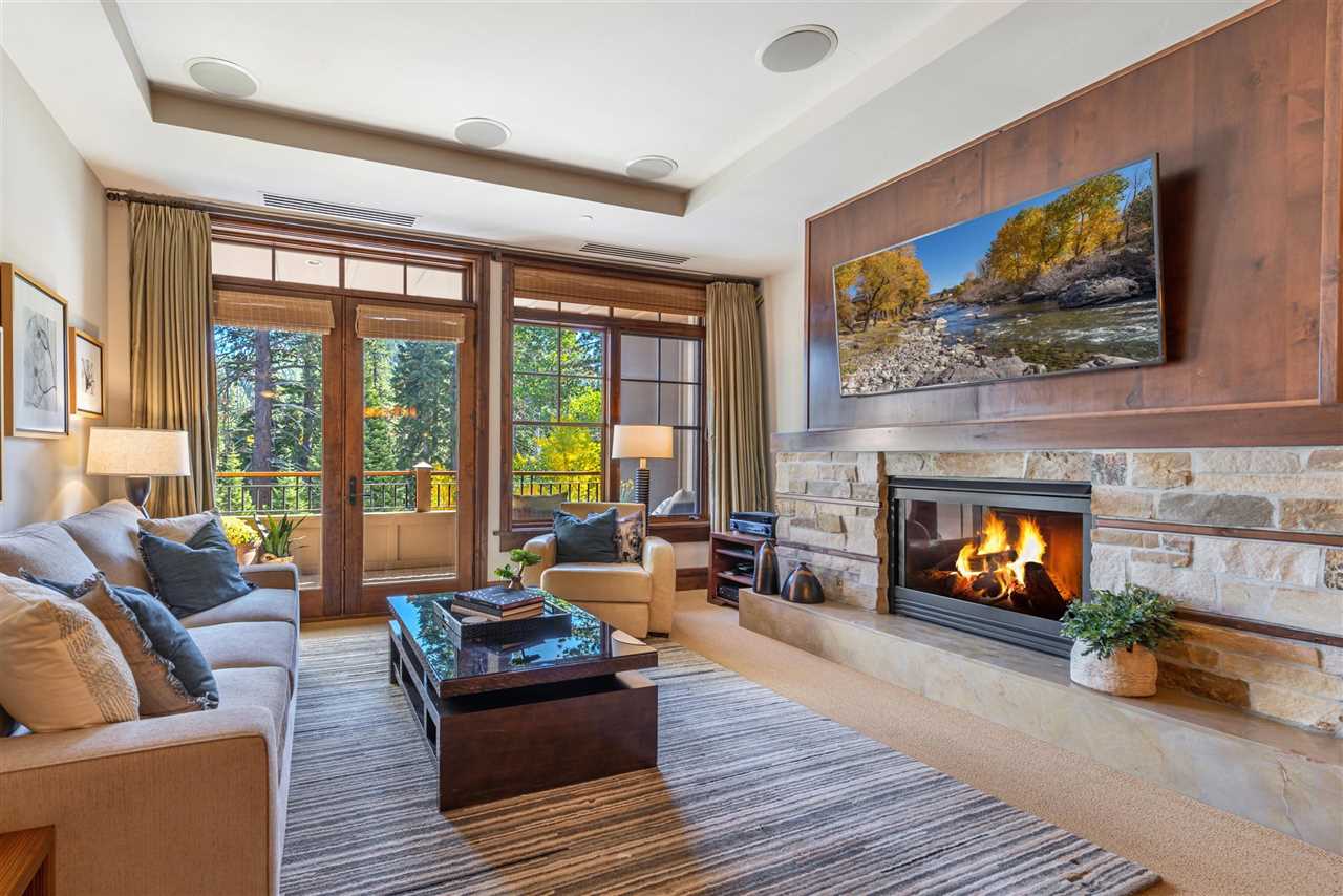 Relax inside by the fireplace while taking in 4 Seasons of Mountain Beauty.
