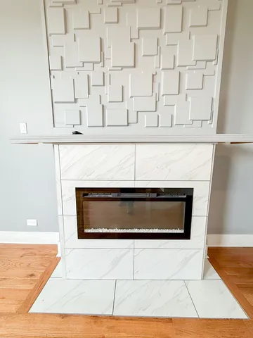 a stove top oven sitting inside of a kitchen