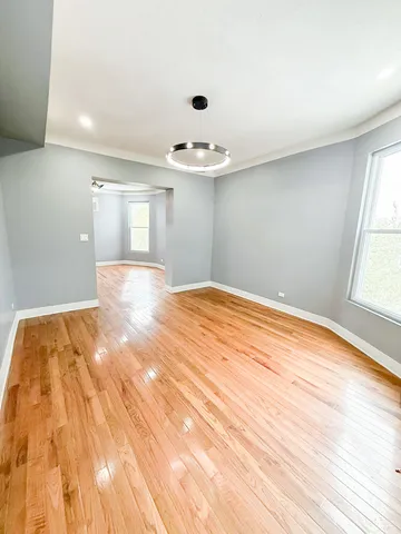 a view of an empty room and window