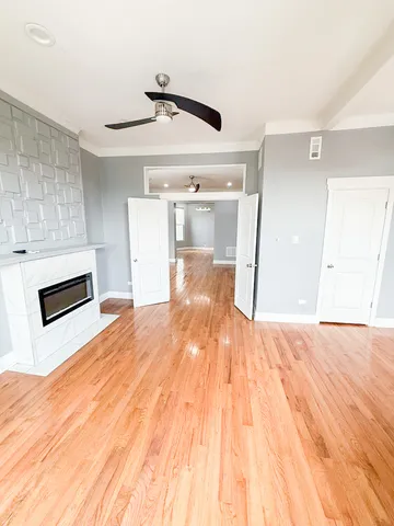 a view of a livingroom with wooden floor