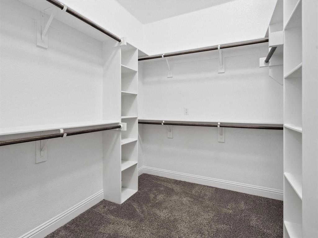 229 Etta Lane Springtown, TX 76082 - Photo 32 of 39 a view of an empty walk in closet