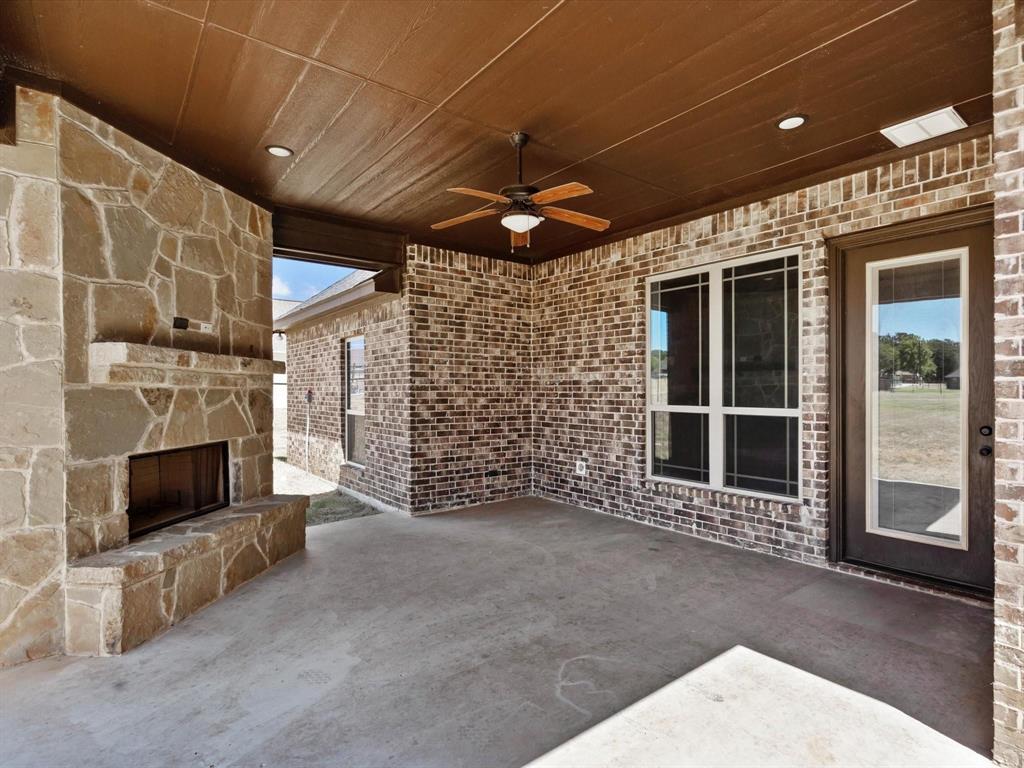 229 Etta Lane Springtown, TX 76082 - Photo 35 of 39 a view of a livingroom with a fireplace