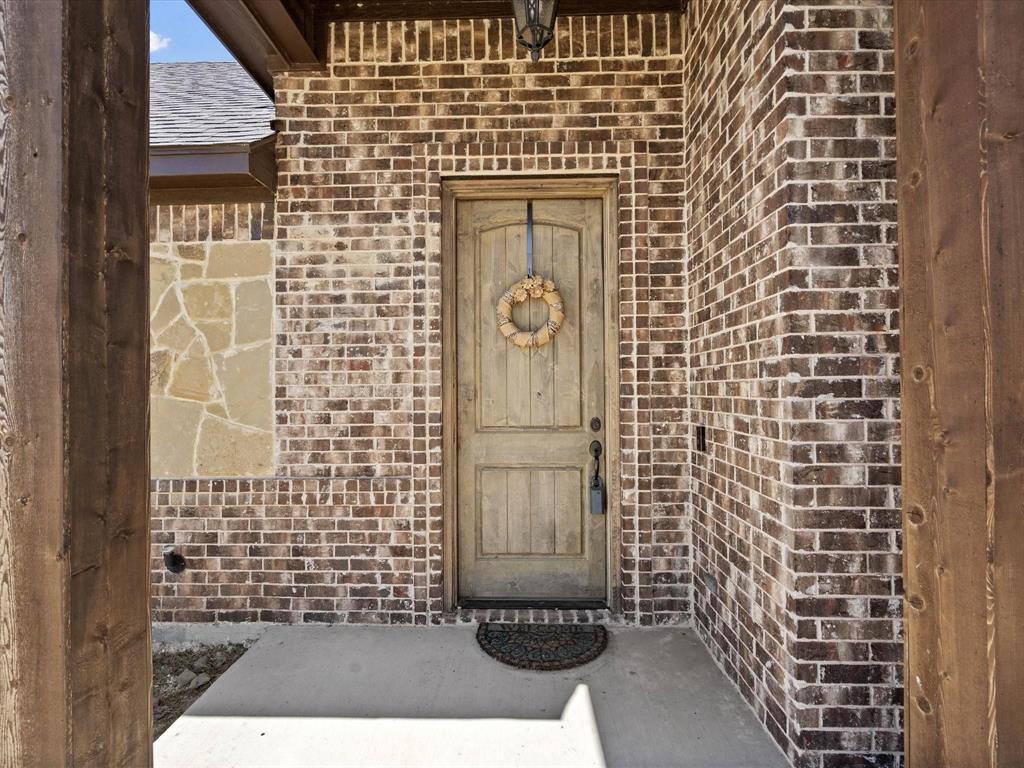 229 Etta Lane Springtown, TX 76082 - Photo 5 of 39 a bathroom with a shower