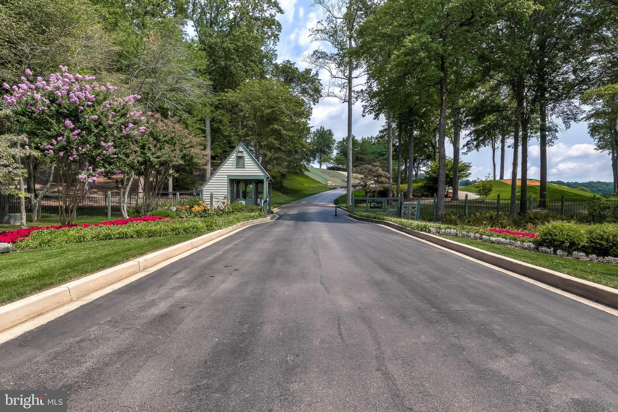 3116 Blendon Road Owings Mills, MD 21117 - Photo 10 of 11 a front view of a house with a yard and potted plants