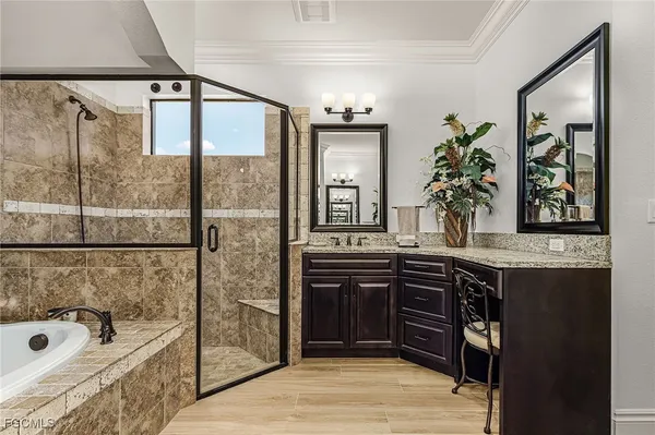 a living room with furniture fireplace and flat screen tv
