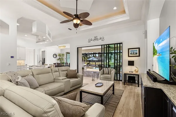 a view of a swimming pool with sitting area