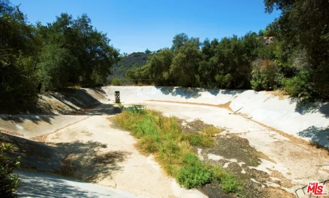 a view of snow on the side of a road