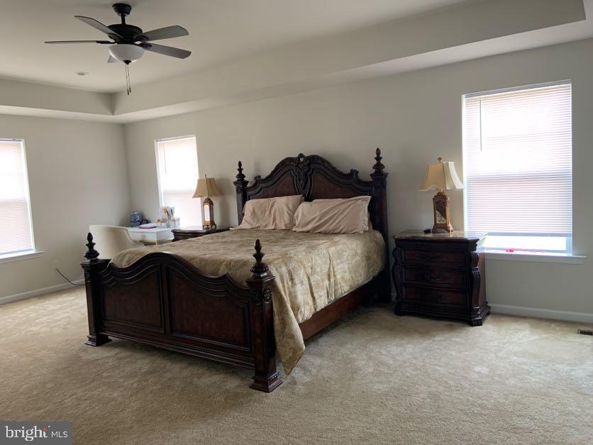 30 South Tompkins Square Downingtown, PA 19335 - Photo 15 of 33 a bedroom with a bed and a window
