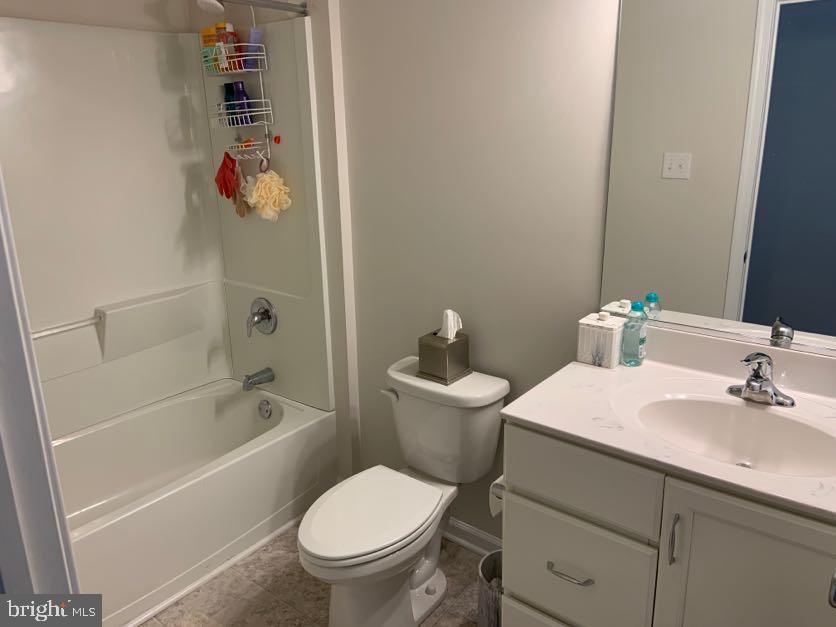30 South Tompkins Square Downingtown, PA 19335 - Photo 27 of 33 a bathroom with a sink a toilet and a bathtub