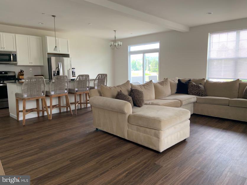 30 South Tompkins Square Downingtown, PA 19335 - Photo 6 of 33 a living room with furniture and a wooden floor