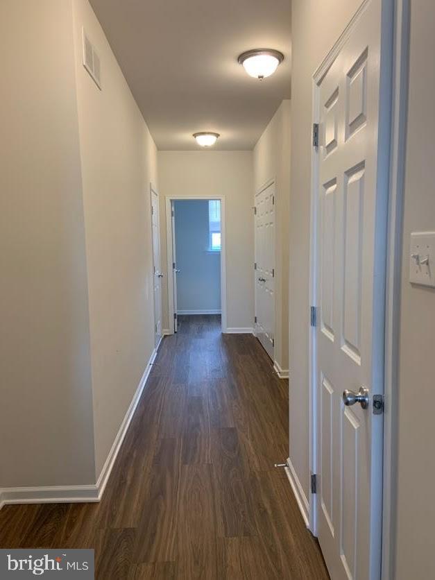30 South Tompkins Square Downingtown, PA 19335 - Photo 9 of 33 a view of a hallway with wooden floor