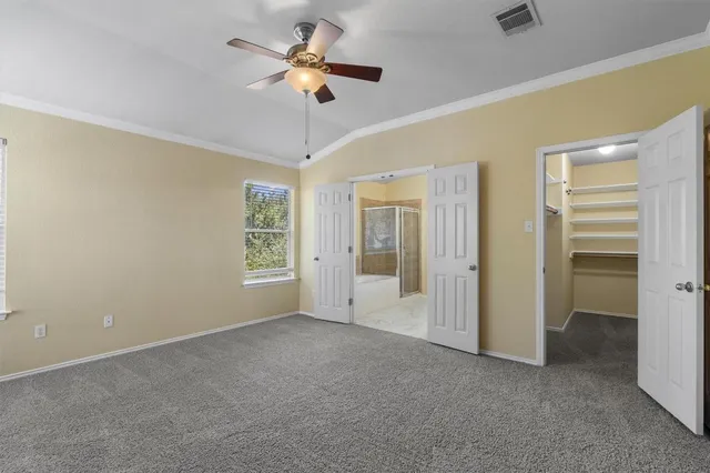 a view of an empty walk in closet