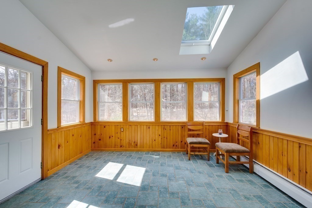 95 Andover Road Billerica, MA 01821 - Photo 11 of 18 a living room with furniture and large windows