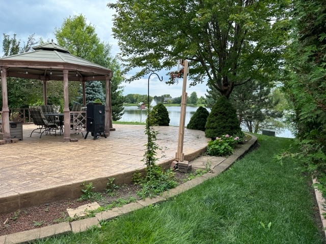 1903 Ridgemoor Drive Plainfield, IL 60586 - Photo 17 of 19 a front view of a house with garden