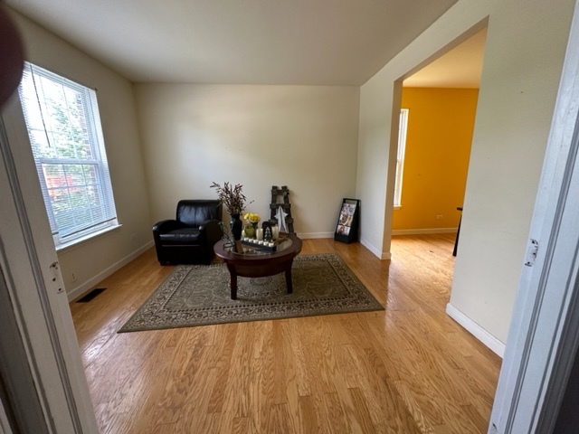 1903 Ridgemoor Drive Plainfield, IL 60586 - Photo 6 of 19 a living room with furniture and a window